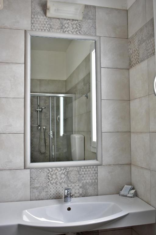 Koupelna v ubytování Hotel Manila