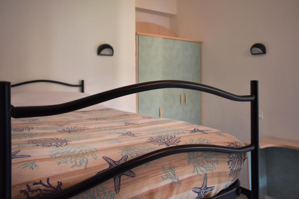 Postel nebo postele na pokoji v ubytování Hotel Manila