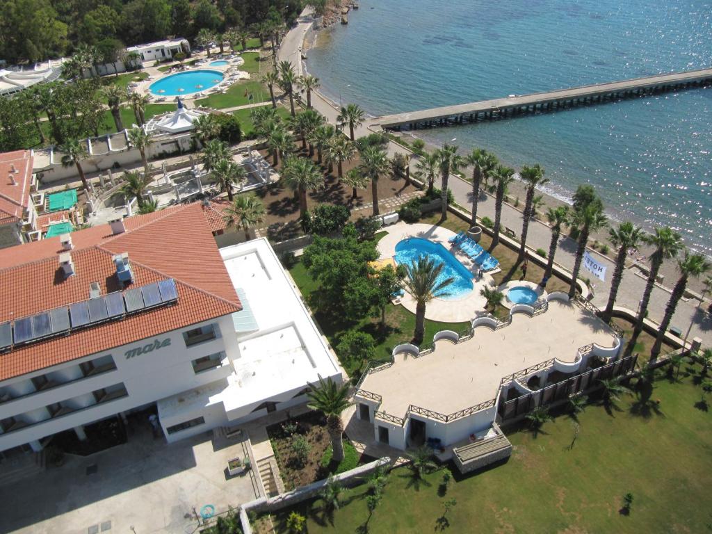 an aerial view of a resort with a pool at Hotel Mare Datca in Datca