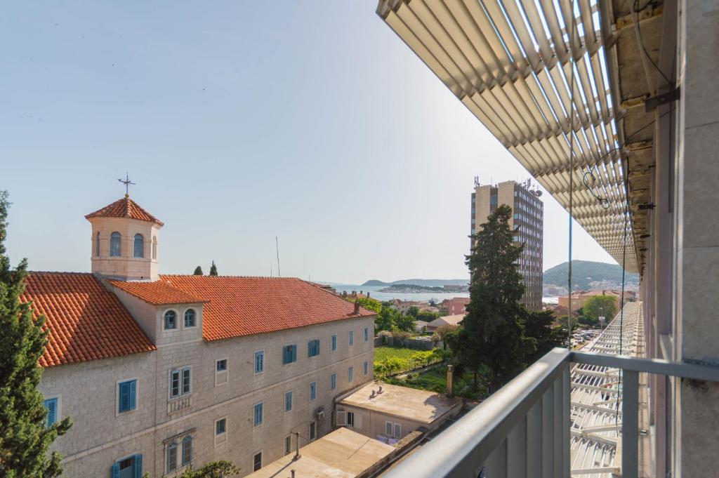 a view of a building from a balcony at Luxury apartment Lucy in center with amazing sea-view in Split