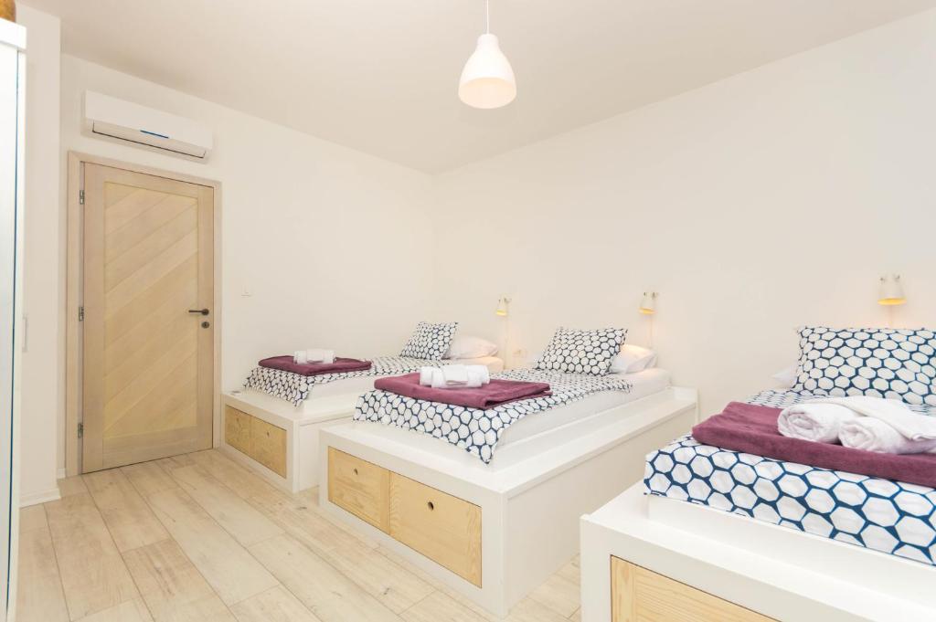 Posteľ alebo postele v izbe v ubytovaní Luxury apartment Lucy in center with amazing sea-view
