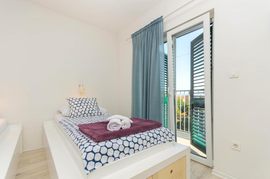 Posteľ alebo postele v izbe v ubytovaní Luxury apartment Lucy in center with amazing sea-view