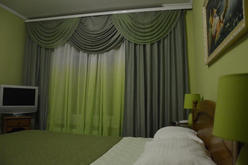 TV a/nebo společenská místnost v ubytování Knaus Apartments