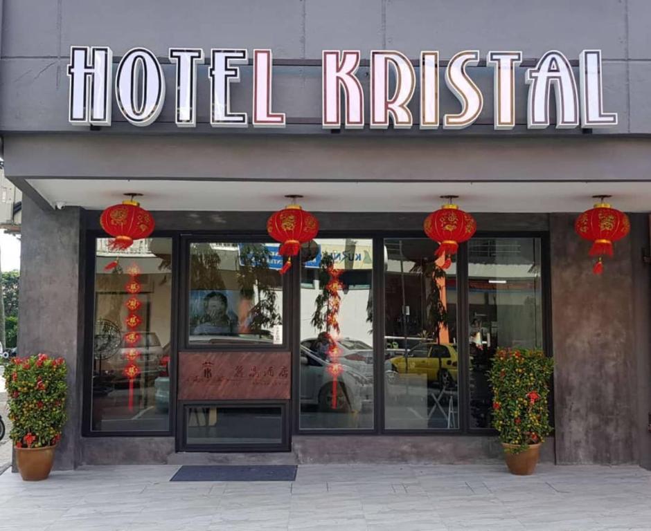 a hotel khtar with a sign on the front of it at Hotel Kristal in Bentong