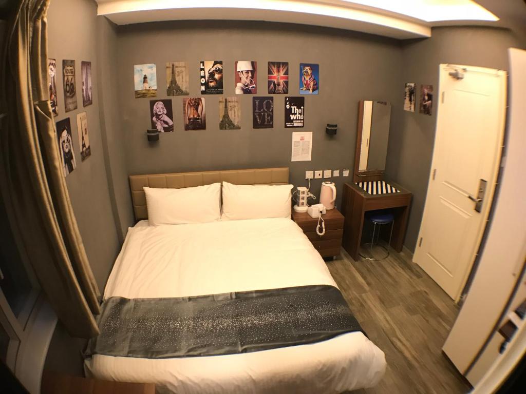 Ένα ή περισσότερα κρεβάτια σε δωμάτιο στο Soso Hostel