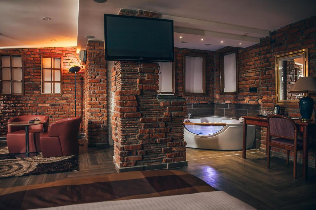 TV a/nebo společenská místnost v ubytování Hotel Super 8