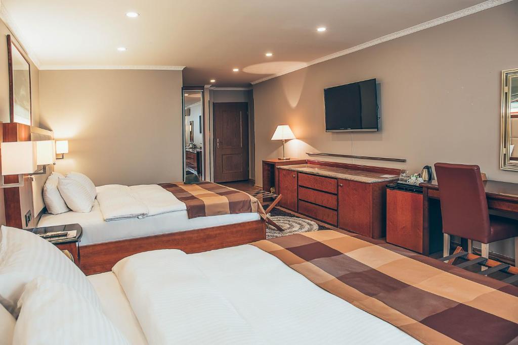 Postel nebo postele na pokoji v ubytování Hotel Super 8