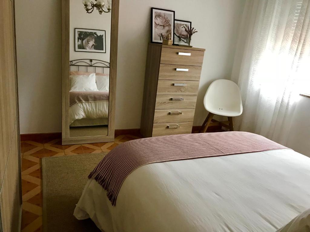 Postel nebo postele na pokoji v ubytování Apartamento Laura