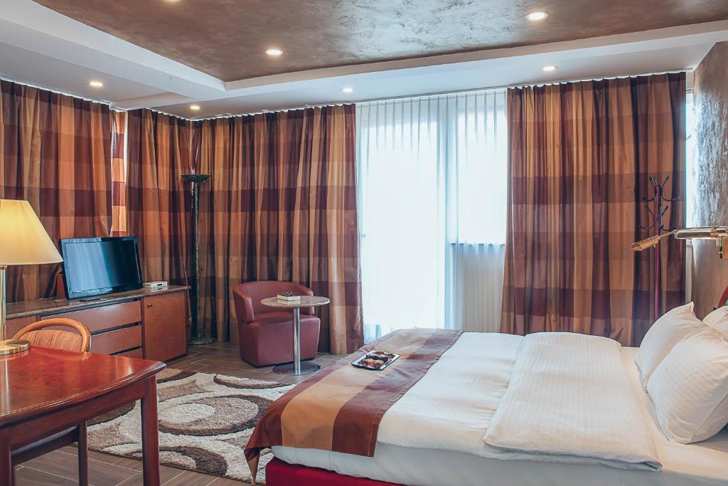 Postel nebo postele na pokoji v ubytování Hotel Super 8