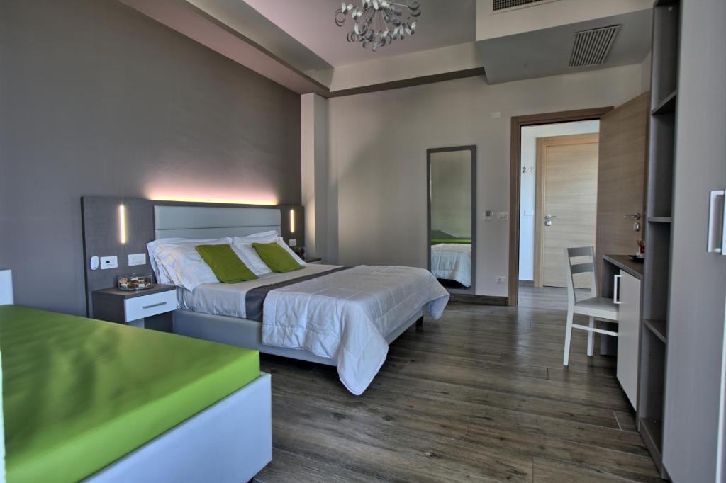 Postel nebo postele na pokoji v ubytování GFH - Hotel Sole Resort & Spa