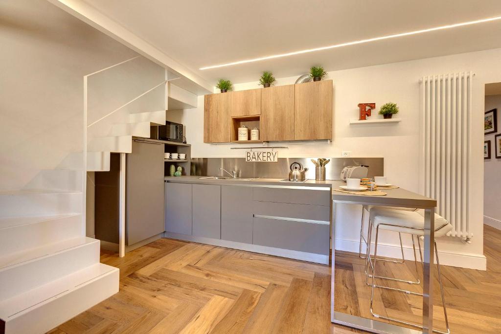 Kuchnia lub aneks kuchenny w obiekcie Mattonaia Apartment by Mamo Florence
