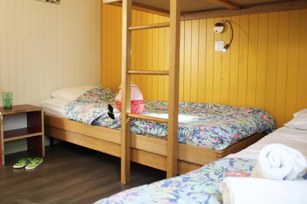 Postel nebo postele na pokoji v ubytování VVF Les Vosges Bitche