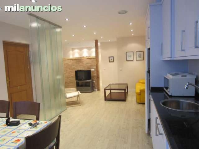 Televízia a/alebo spoločenská miestnosť v ubytovaní apartamento el mirador
