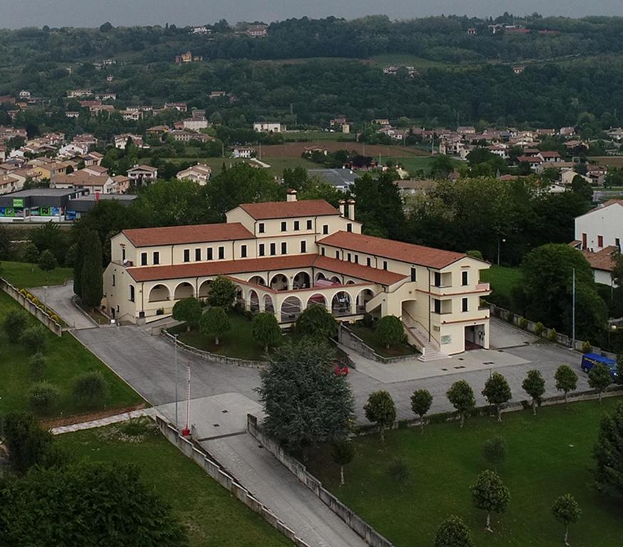 an aerial view of a large building in a city at Hotel San Marco in Montebelluna
