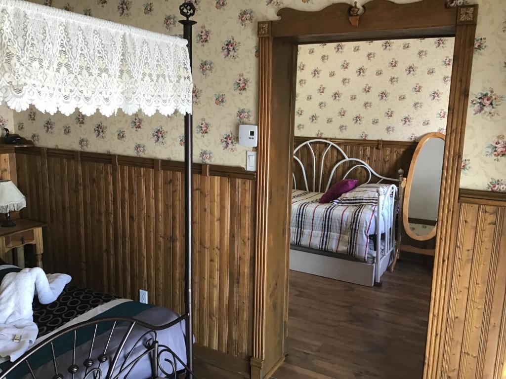 Postel nebo postele na pokoji v ubytování Auberge La Cote d'Or