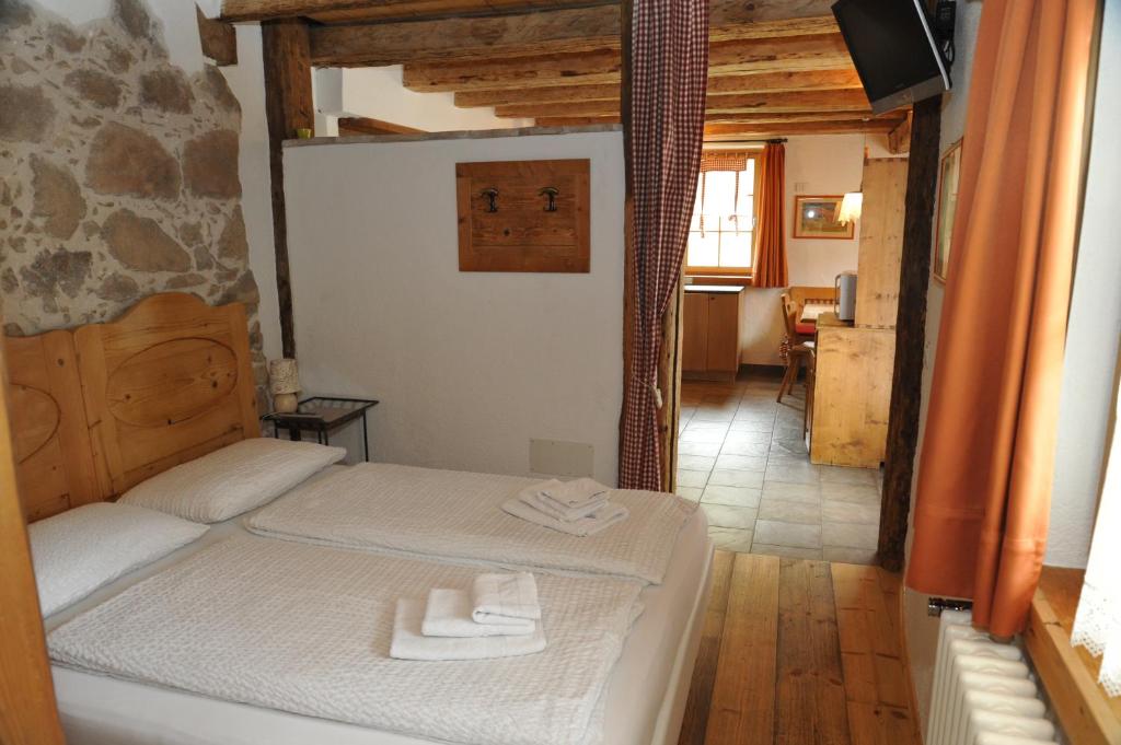 Postel nebo postele na pokoji v ubytování Maso Franceschella