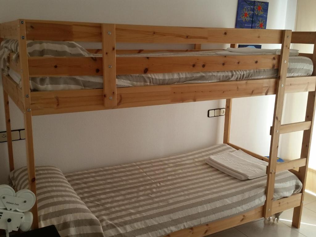 Postel nebo postele na pokoji v ubytování Villa Fabiola