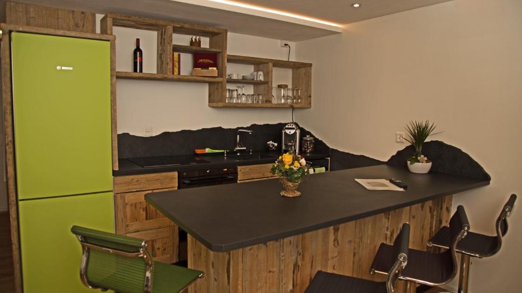 Kuchyň nebo kuchyňský kout v ubytování Conny's B&B