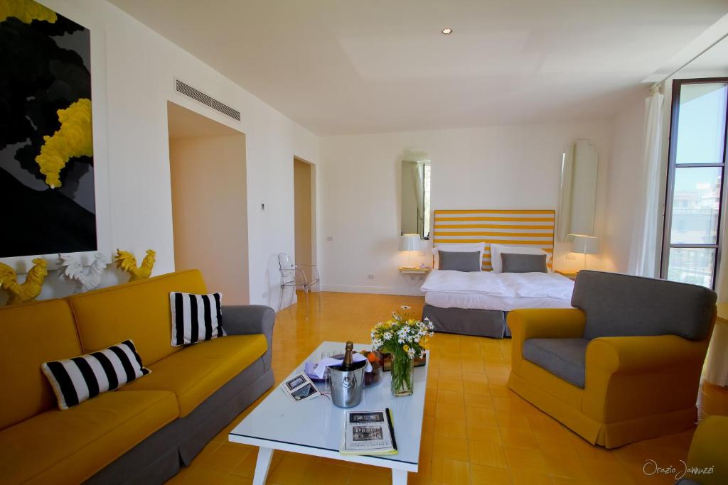 Postel nebo postele na pokoji v ubytování Palazzo Jannuzzi Relais