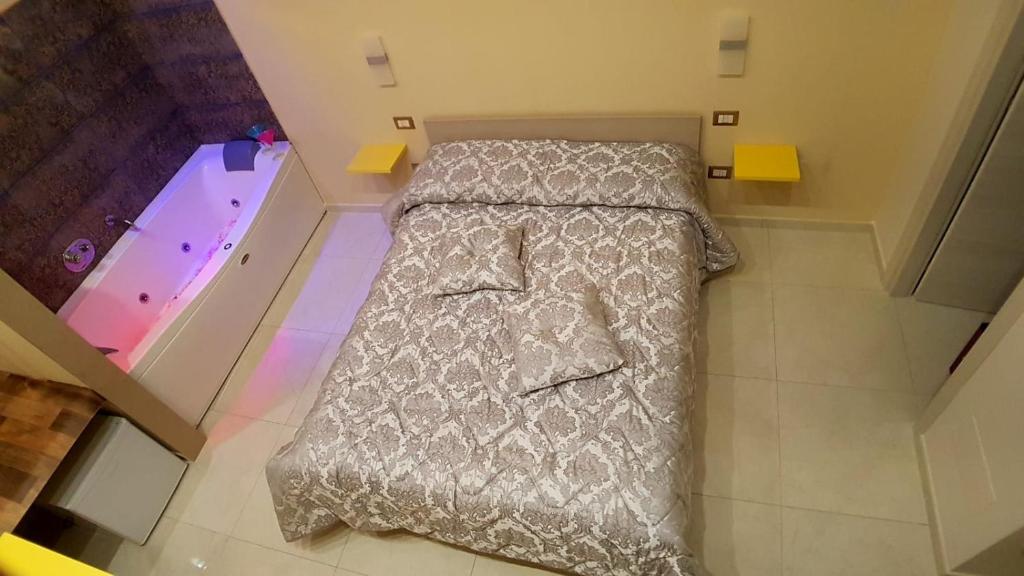 Postel nebo postele na pokoji v ubytování ManfredoniaJacuzzi