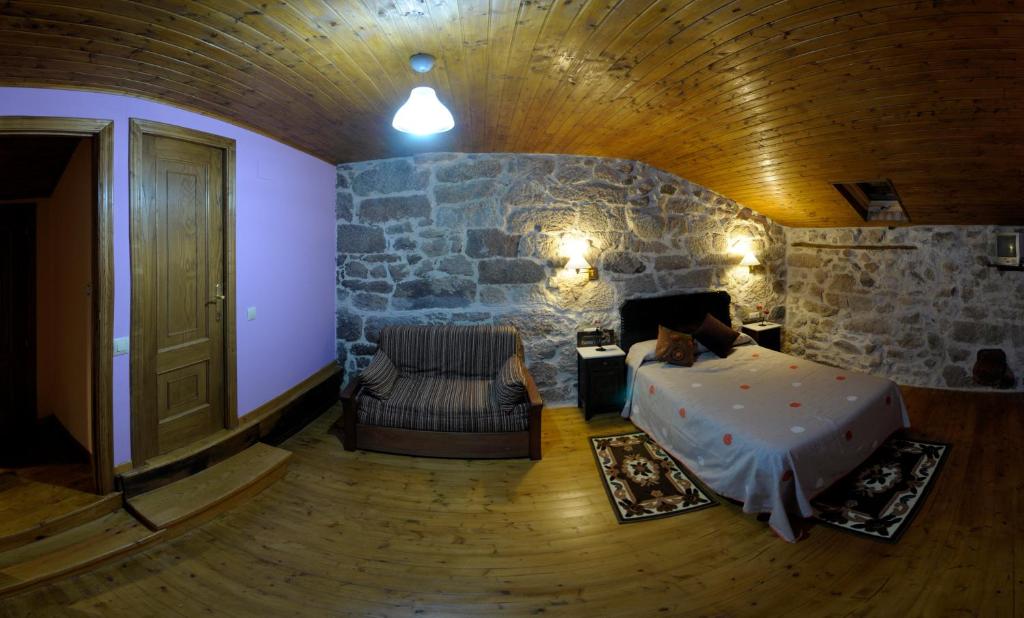 Postel nebo postele na pokoji v ubytování Casa Dos Fuelles