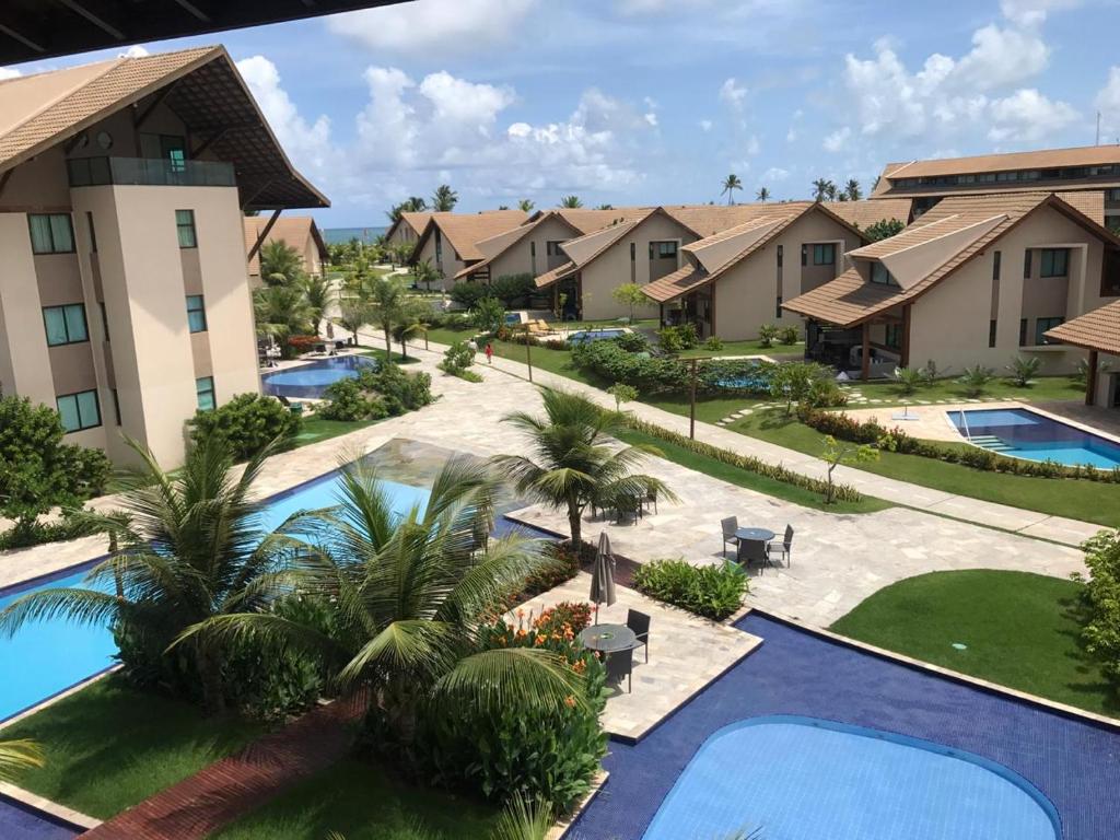 una vista aérea de un complejo con piscina en Muro Alto - Nui Supreme, en Ipojuca