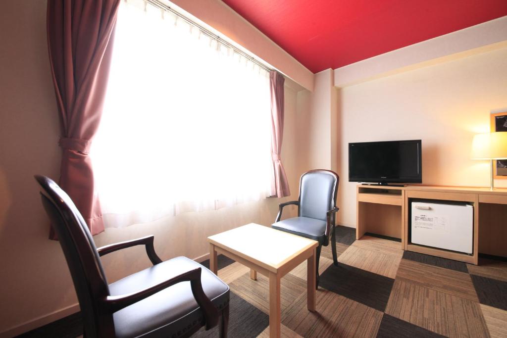 TV a/nebo společenská místnost v ubytování Quintessa Hotel Iseshima