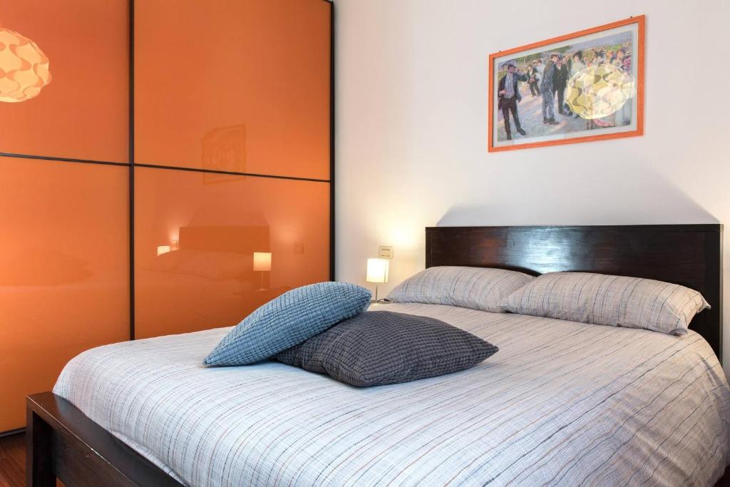 Letto o letti in una camera di Comforty - Stay in Verona
