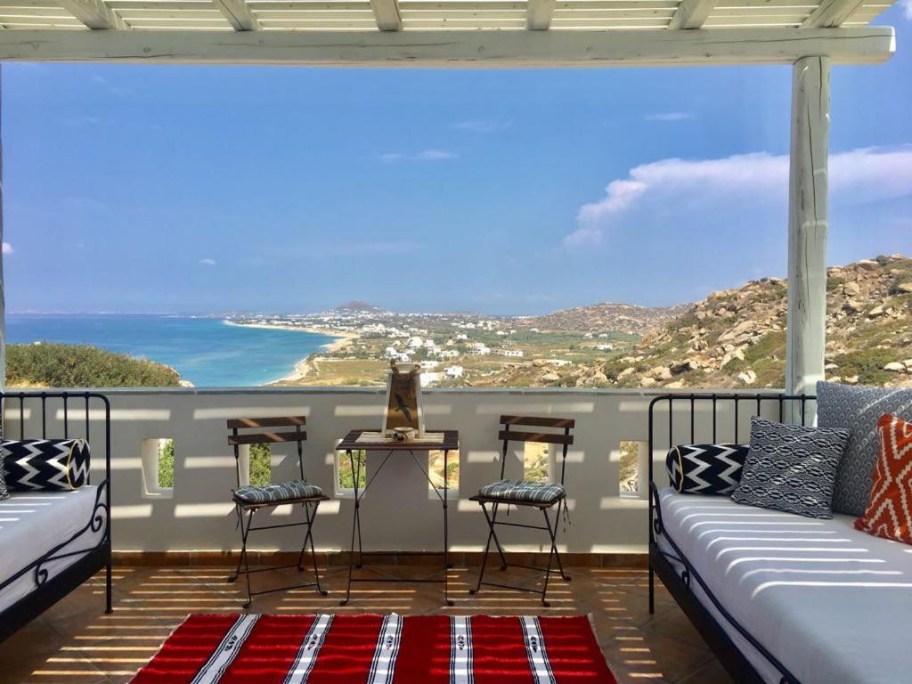 a room with a view of the ocean at Villa Kiko in Mikri Vigla
