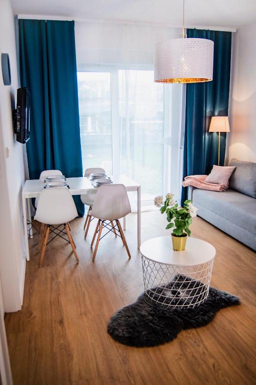 Posteľ alebo postele v izbe v ubytovaní Apartamenty Rakowicka WAWELOFTS