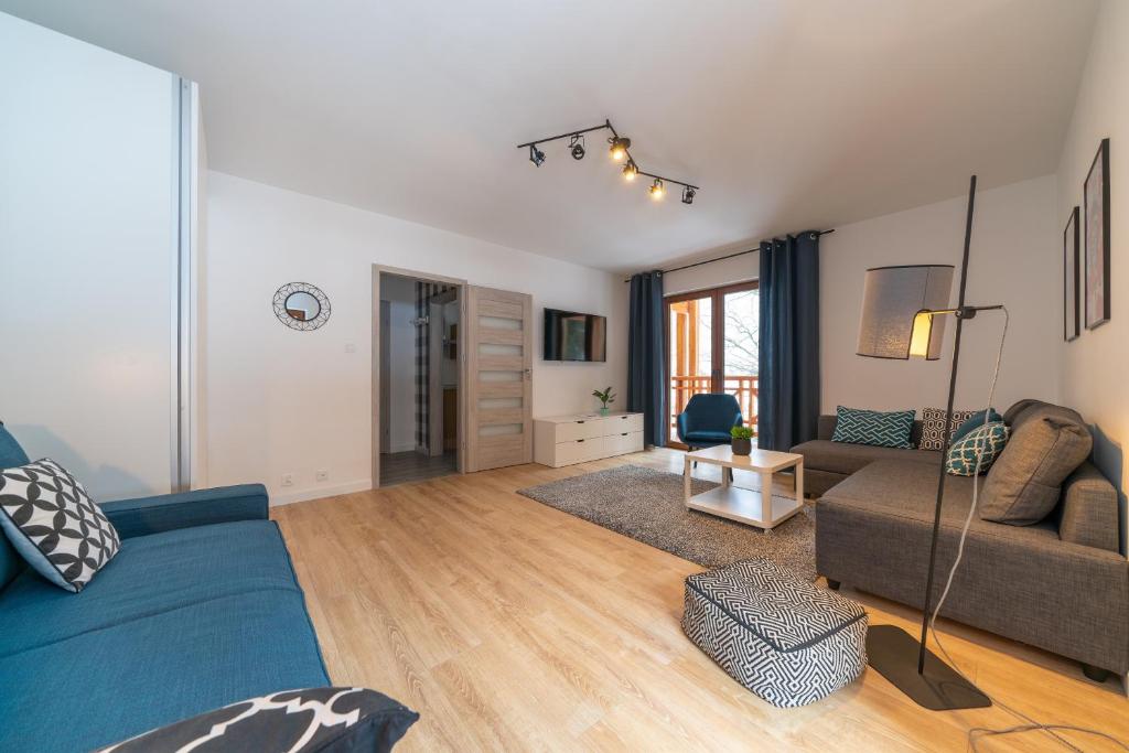 Część wypoczynkowa w obiekcie RentPlanet - Apartamenty Szrenica