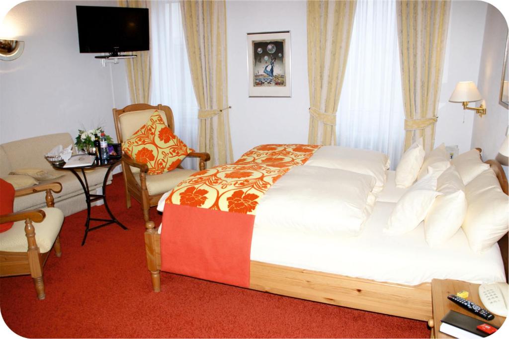 Postel nebo postele na pokoji v ubytování Haus Berlin