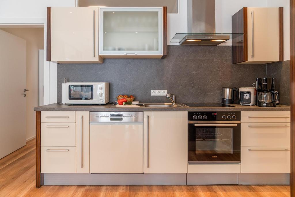 Kuchyňa alebo kuchynka v ubytovaní Appartement - das kleine Bleiberger by Schladmingurlaub