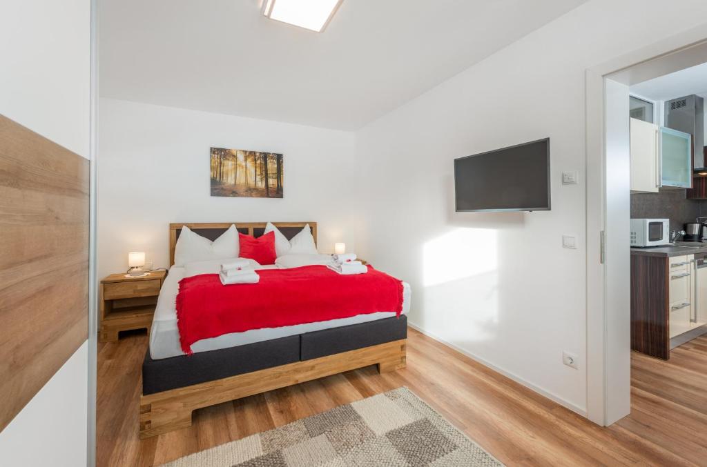 Posteľ alebo postele v izbe v ubytovaní Appartement - das kleine Bleiberger by Schladmingurlaub