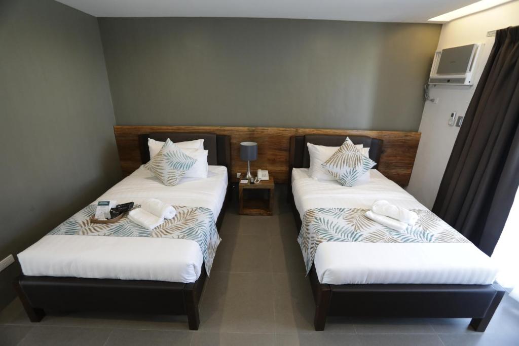 Postel nebo postele na pokoji v ubytování Balar Hotel and Spa