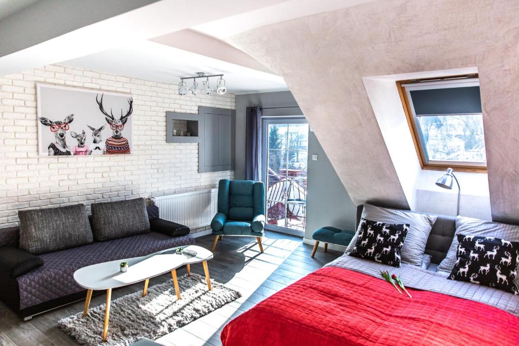 Posedenie v ubytovaní Apartament Łania Frania