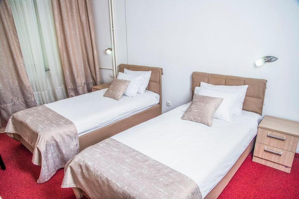 Postel nebo postele na pokoji v ubytování Hotel N