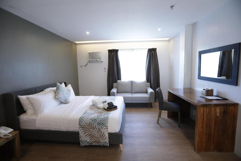Postel nebo postele na pokoji v ubytování Balar Hotel and Spa