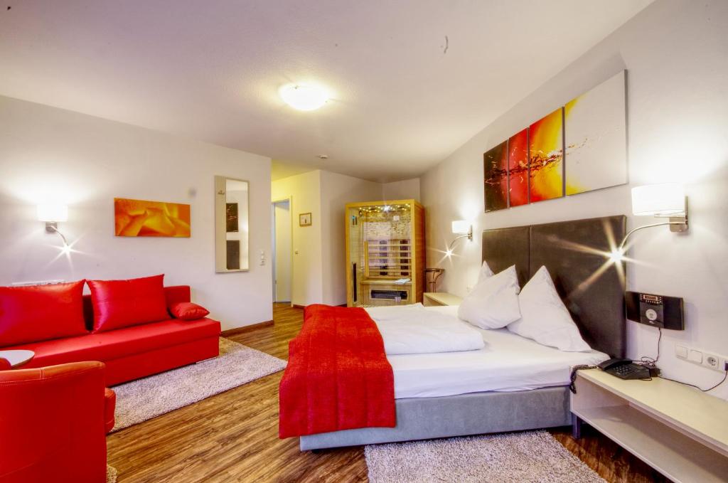Postel nebo postele na pokoji v ubytování Hotel Jakob