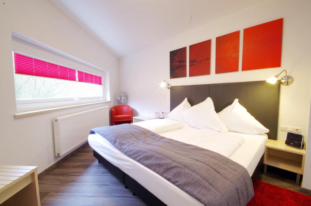 Postel nebo postele na pokoji v ubytování Hotel Jakob