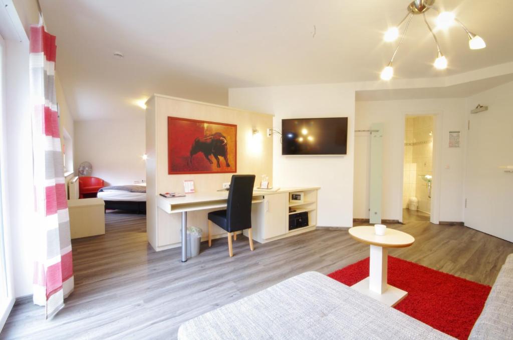 TV a/nebo společenská místnost v ubytování Hotel Jakob