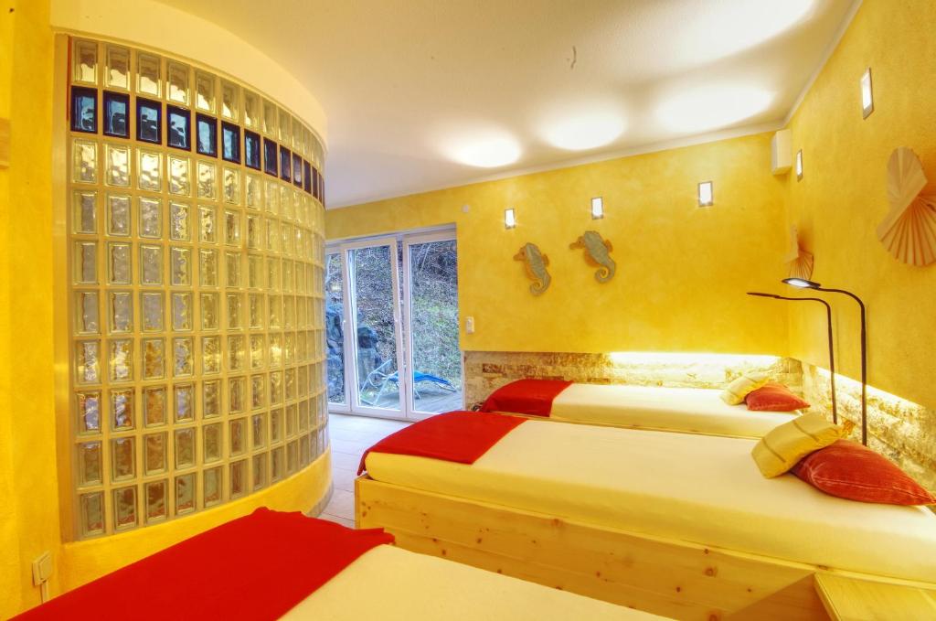 Postel nebo postele na pokoji v ubytování Hotel Jakob