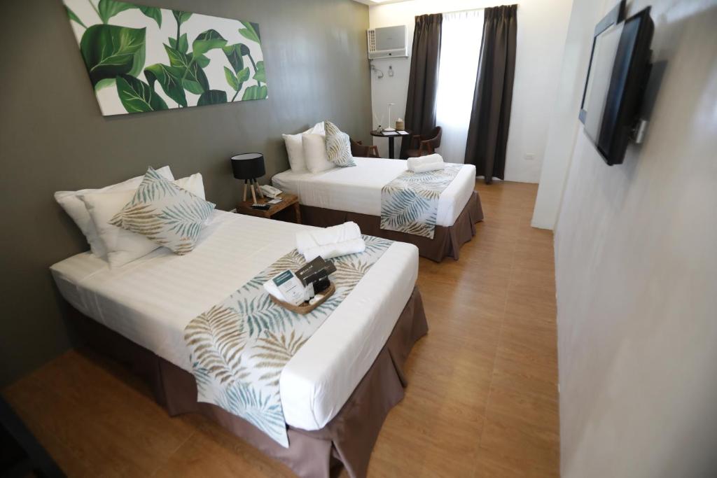 Postel nebo postele na pokoji v ubytování Balar Hotel and Spa