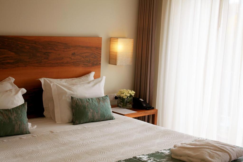 Uma cama ou camas num quarto em Convento Da Serta Hotel