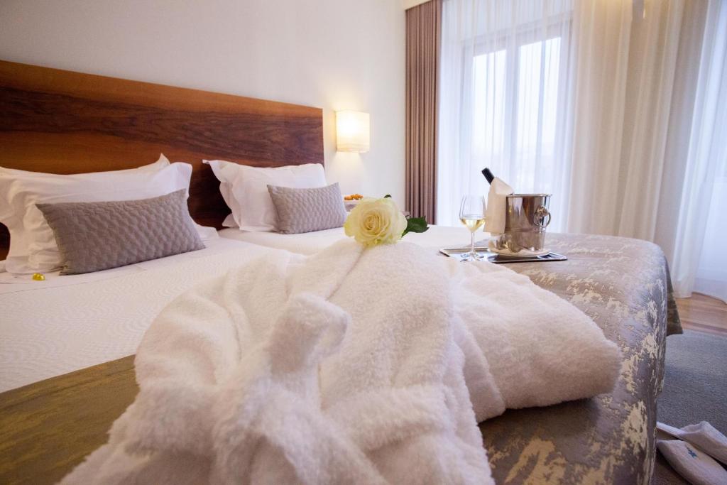 Uma cama ou camas num quarto em Convento Da Serta Hotel