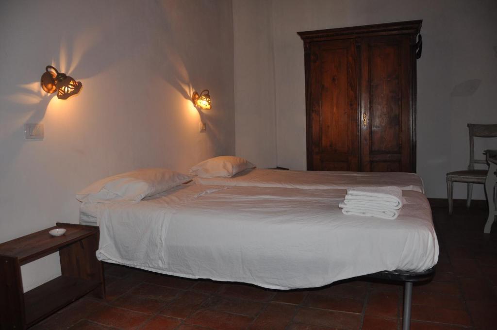Postel nebo postele na pokoji v ubytování B&B Alsoci-La Tasca