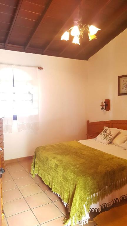 Postel nebo postele na pokoji v ubytování Casa Domingo Simón