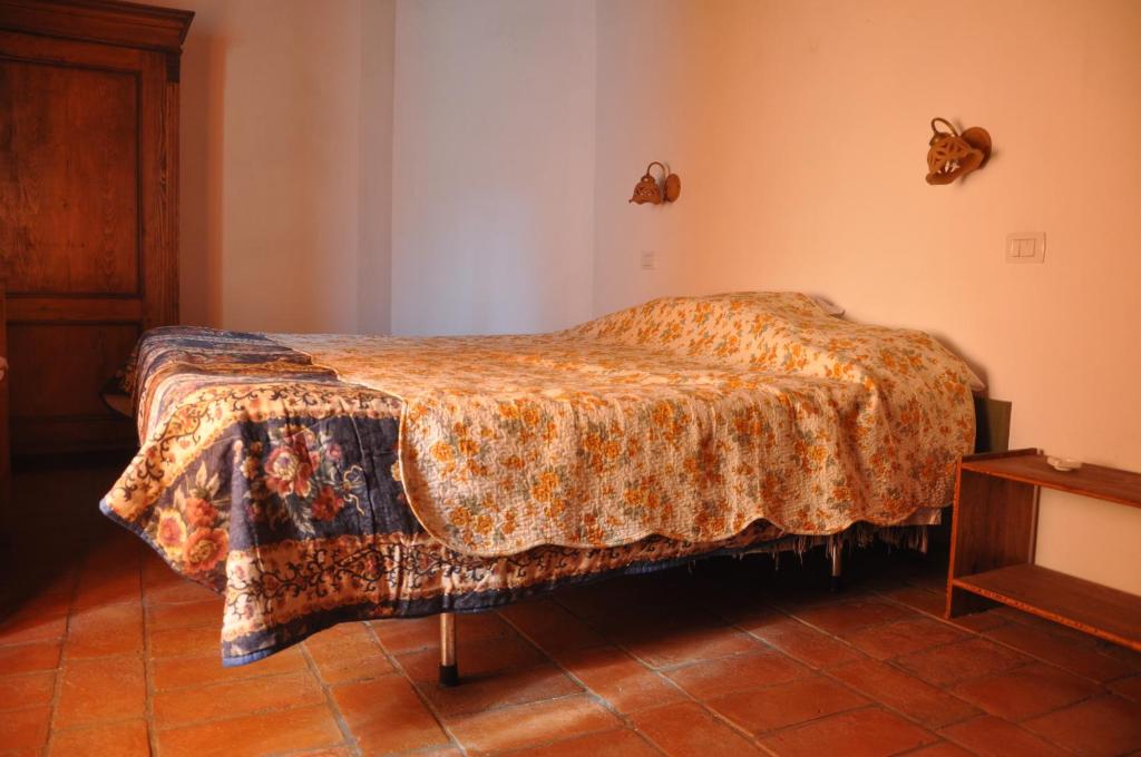 Postel nebo postele na pokoji v ubytování B&B Alsoci-La Tasca