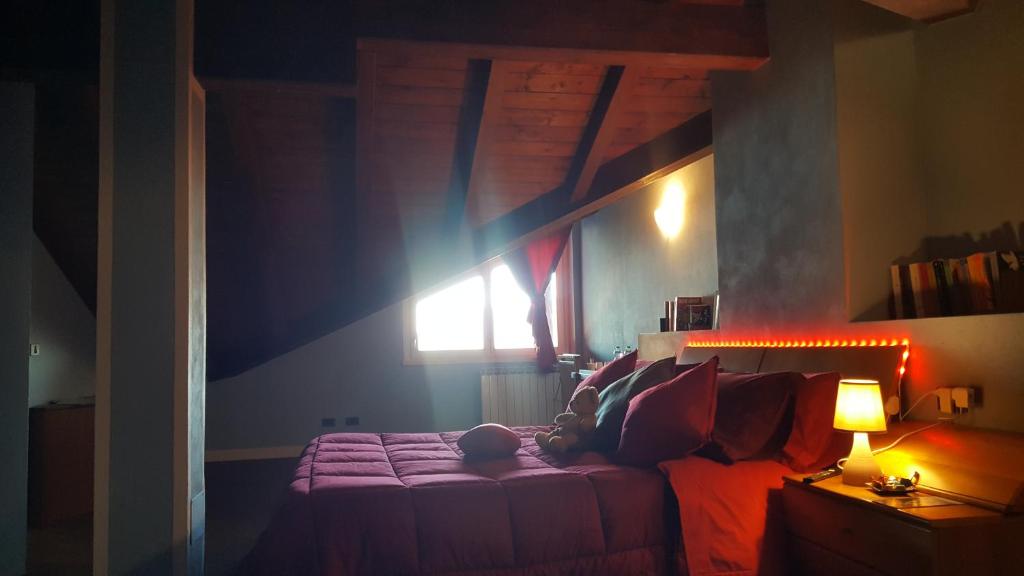 Postel nebo postele na pokoji v ubytování Alba sul lago