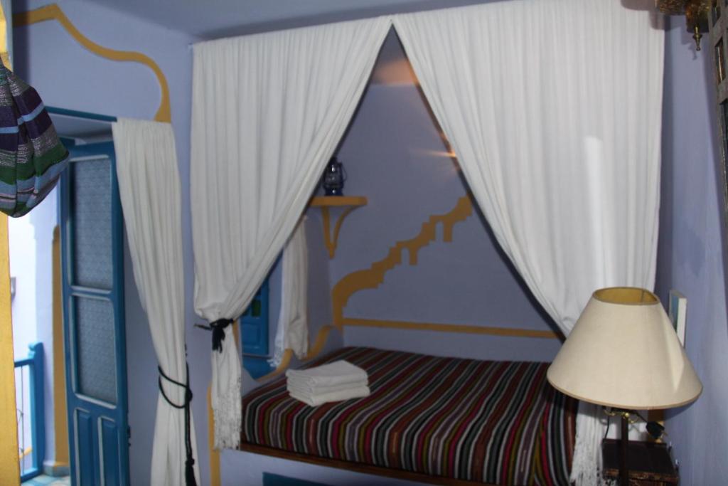Cama o camas de una habitación en Hôtel Dar Terrae